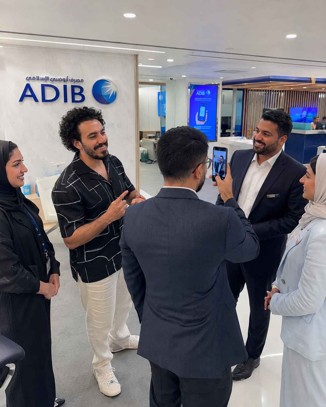 Joker Program · ADIB branch lobby filming