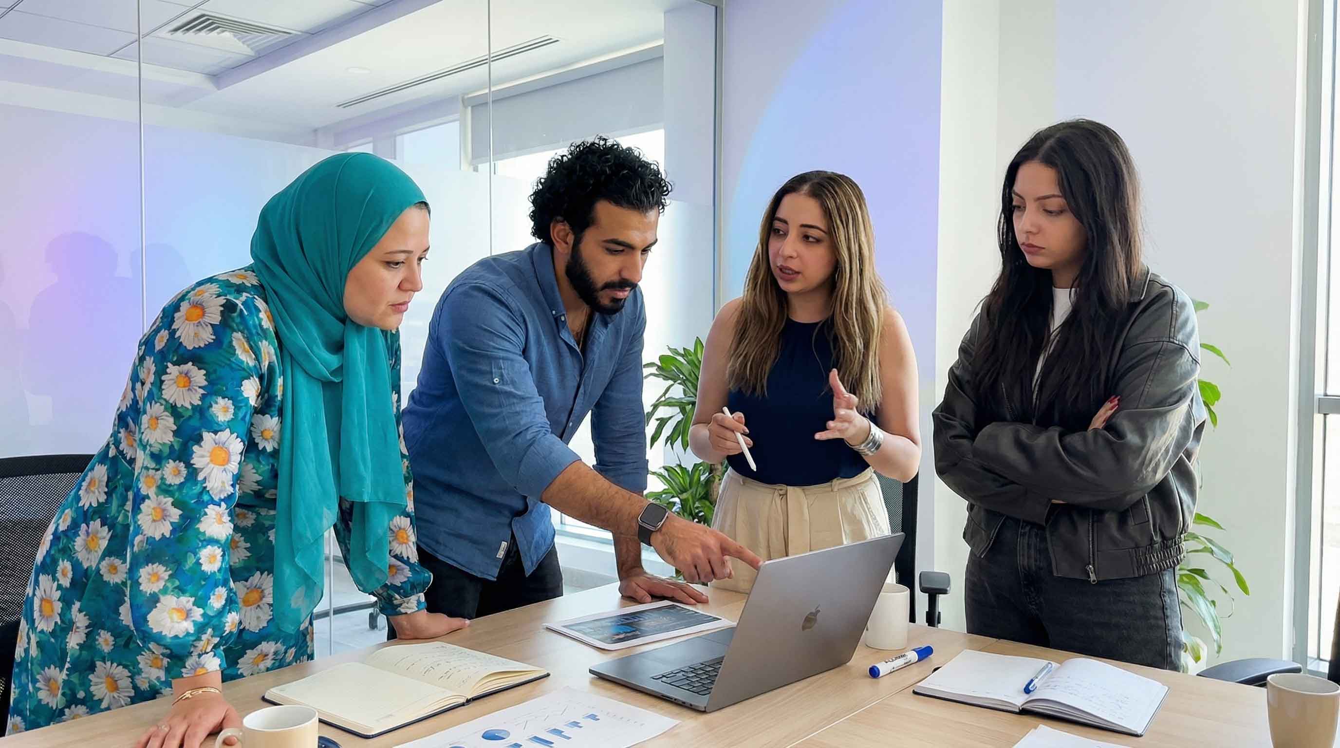 Account managers and clients at a review meeting
